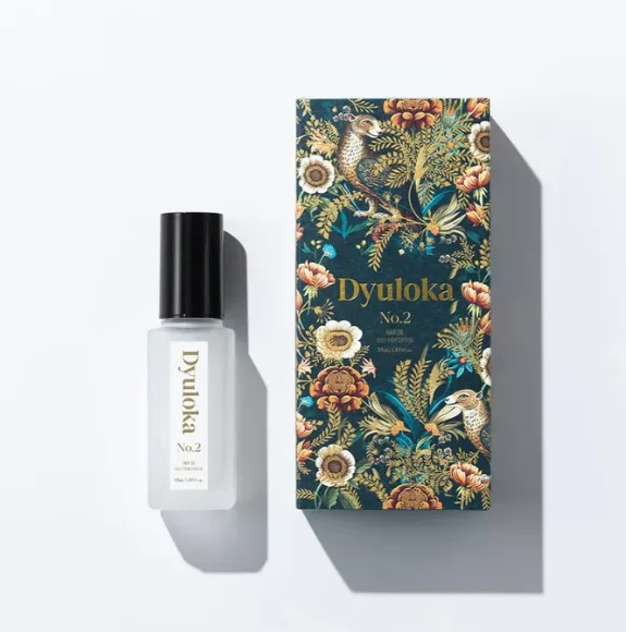 Applying Dyuloka Hair Oil