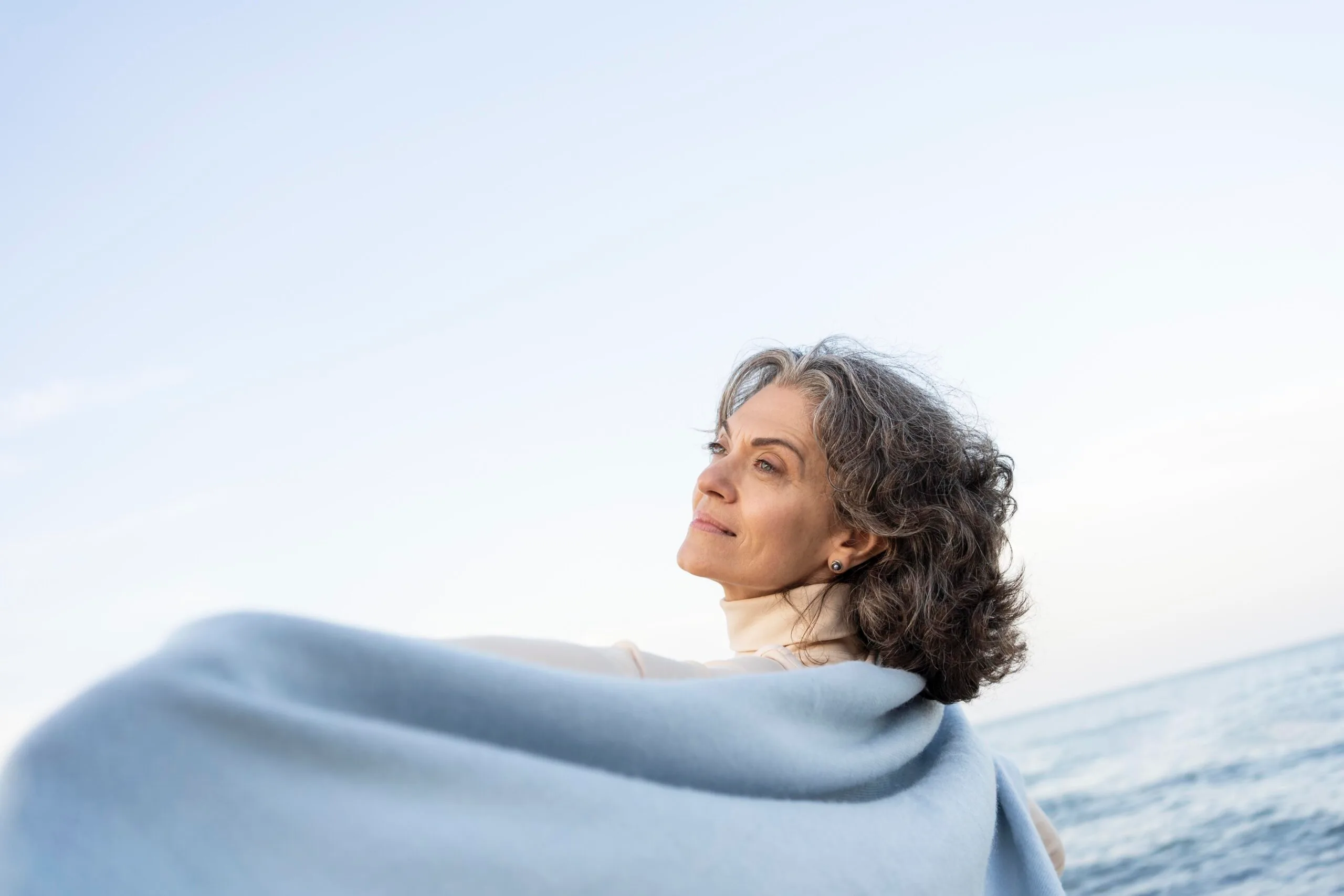 midlife woman gentle wellness lifestyle soft natural light