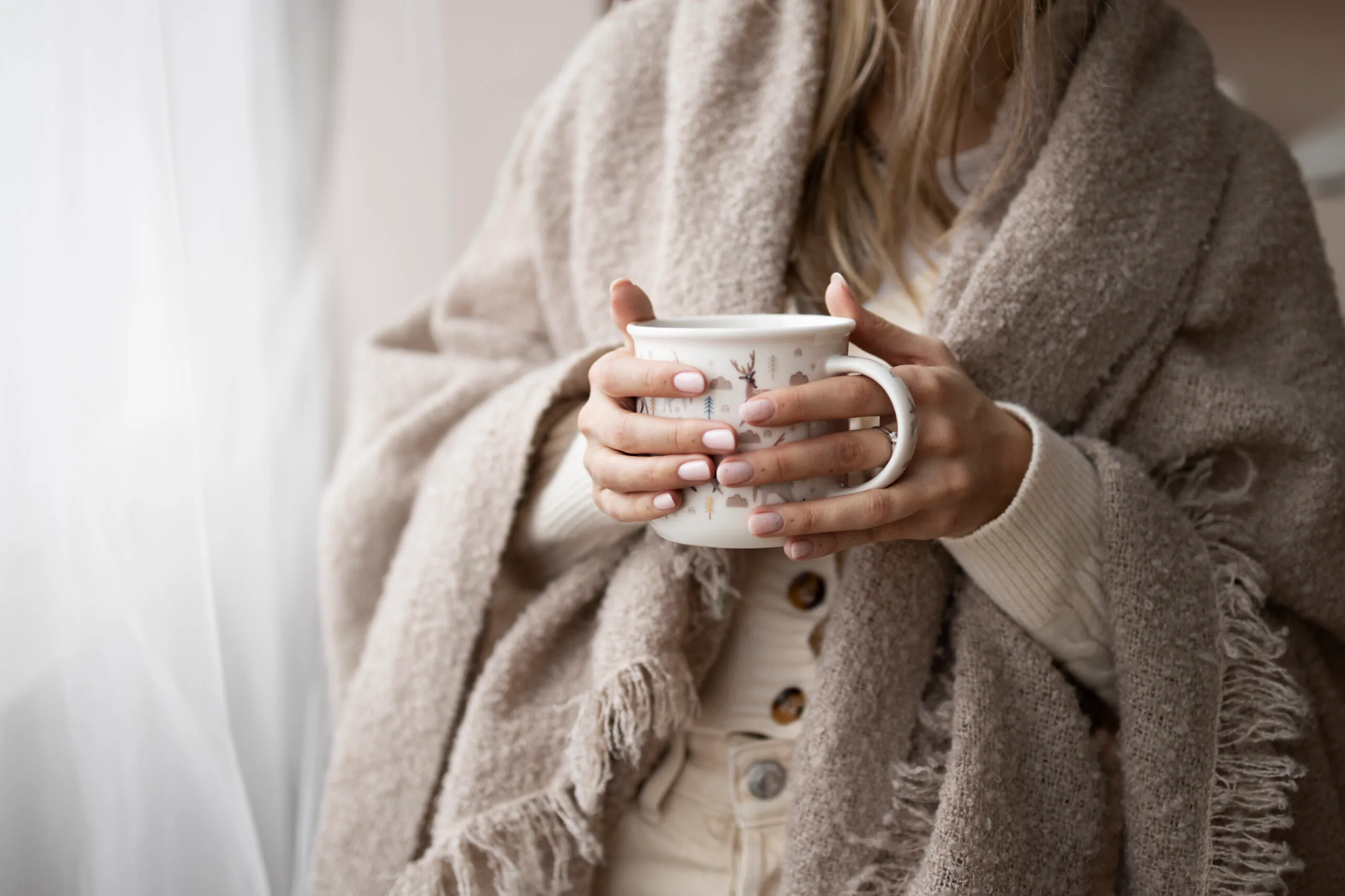 cozy winter morning coffee blanket lifestyle